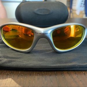 Oakley “Straight Jacket’s” Silver Fire Iridium lens